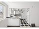 Bright kitchen featuring contrasting black and white cabinets at 309 S Hudson St, Denver, CO 80246