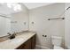 Tastefully designed bathroom with a granite countertop, modern fixtures, and tile floors, providing a luxurious feel at 23539 E Ida Dr # C, Aurora, CO 80016