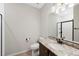 Bathroom featuring a granite vanity, and a large mirror, with a full shower at 23539 E Ida Dr # C, Aurora, CO 80016