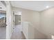 This hallway has carpet and provides access to other rooms in the house at 23539 E Ida Dr # C, Aurora, CO 80016