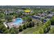 Beautiful aerial view showcases the community pool near your home at 2737 Ulster St, Denver, CO 80238