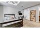 Inviting bedroom with a bed, desk, bookshelf, and ample storage, offering a peaceful and organized retreat at 2737 Ulster St, Denver, CO 80238