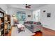 Relax in this welcoming living room with ample natural light and stylish decor at 2737 Ulster St, Denver, CO 80238