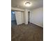 Bedroom features carpet, closet, and a window at 5552 Abilene St, Denver, CO 80239