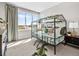 bedroom showcasing a unique bed frame, large window and natural light at 1787 W 166Th Ave, Broomfield, CO 80023