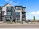 Modern home with stone and gray siding offering a small balcony at 1787 W 166Th Ave, Broomfield, CO 80023