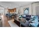 Open living space features a comfortable living room, stylish dining area, and modern kitchen at 1787 W 166Th Ave, Broomfield, CO 80023
