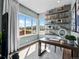 Bright office with large windows, modern desk, stylish shelving, and neutral decor at 1787 W 166Th Ave, Broomfield, CO 80023