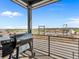Outdoor patio featuring a grill overlooking a construction project with metal framing and a clear blue sky at 1787 W 166Th Ave, Broomfield, CO 80023