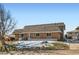 Charming single-story brick home featuring a well-maintained front yard and a cozy entrance at 9943 Croke Dr, Denver, CO 80260