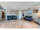 Spacious living room with wood-look floors and comfortable seating at 9943 Croke Dr, Denver, CO 80260