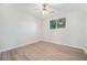 Bright bedroom with a ceiling fan and a large window offering natural light and views at 16259 W 10Th Ave # K-3, Golden, CO 80401