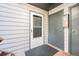 A welcoming front door with a screen door and unit number, providing convenient access to the property at 16259 W 10Th Ave # K-3, Golden, CO 80401