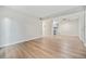 A spacious living room with hardwood flooring that connects to the kitchen at 16259 W 10Th Ave # K-3, Golden, CO 80401
