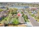 This aerial view shows a house among other houses at 8353 Adams Way, Denver, CO 80221