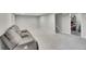 Bright basement featuring neutral carpet, recessed lighting and access to additional storage at 8353 Adams Way, Denver, CO 80221