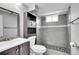 This bathroom offers a shower, a sink, and a toilet at 8353 Adams Way, Denver, CO 80221