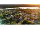 Scenic aerial view of the neighborhood with a lake and a mountain in the background at 3812 W 24Th Ave, Denver, CO 80211