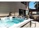 Enjoy relaxing in this outdoor hot tub with a view of the custom outdoor kitchen and patio area at 3812 W 24Th Ave, Denver, CO 80211