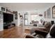 Spacious living room with comfortable seating, TV, and stylish decor at 3812 W 24Th Ave, Denver, CO 80211