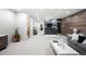 Finished basement with entertainment area, wet bar, and modern lighting at 417 N Madison St, Denver, CO 80206