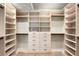 Spacious walk-in closet with custom built-ins and ample storage space for your wardrobe needs at 417 N Madison St, Denver, CO 80206