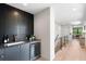 Hallway featuring a stylish bar area and modern design at 417 N Madison St, Denver, CO 80206