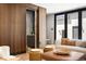 Bright living room with modern furnishings, wood accents, and light hardwood floors at 417 N Madison St, Denver, CO 80206