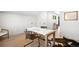 Inviting office space with a minimalist design, hardwood floors, and a large window at 417 N Madison St, Denver, CO 80206
