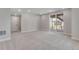 Large basement area with access to the backyard and neutral color palette at 6863 Oak Canyon Cir, Castle Pines, CO 80108