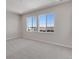 Bright bedroom with large windows and neutral carpet, offering scenic views at 6863 Oak Canyon Cir, Castle Pines, CO 80108