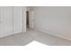 A bedroom featuring neutral carpet, light gray walls and closet with double doors at 6863 Oak Canyon Cir, Castle Pines, CO 80108