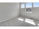 Sunlight streams into this bedroom with neutral carpet and light grey walls at 6863 Oak Canyon Cir, Castle Pines, CO 80108