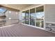 A covered patio with sliding glass doors providing indoor-outdoor living at 6863 Oak Canyon Cir, Castle Pines, CO 80108