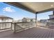 An outdoor deck with views of the neighborhood at 6863 Oak Canyon Cir, Castle Pines, CO 80108
