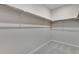 A walk-in closet featuring shelving and plenty of room for storage at 6863 Oak Canyon Cir, Castle Pines, CO 80108