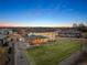 Expansive backyard with a covered patio on this home offering ample outdoor space for entertaining at 15 Latigo Pl, Littleton, CO 80123