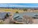 Stunning aerial view of a house with mature landscaping, close to golf course at 15123 Xenia St, Thornton, CO 80602