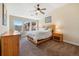 Cozy bedroom with natural light, vaulted ceiling, and comfortable furnishings at 15123 Xenia St, Thornton, CO 80602