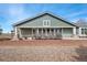 Charming front exterior with stone accents and a well-maintained rock garden at 15123 Xenia St, Thornton, CO 80602