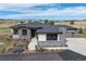 Luxury home with mountain views, landscaping, and a large driveway at 2730 Fox View Trl, Franktown, CO 80116