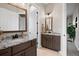 Bathroom with granite countertop and dark brown cabinets at 2730 Fox View Trl, Franktown, CO 80116