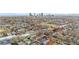 Stunning aerial view of a Denver neighborhood with the city skyline in the background at 3426 N Gilpin St, Denver, CO 80205