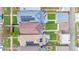 Aerial view of residences reveals a well-maintained community with inviting backyard patios and solar panels at 3426 N Gilpin St, Denver, CO 80205