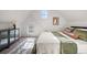 Inviting bedroom with modern furniture, pitched ceiling, and lots of light features a cozy relaxing atmosphere at 3426 N Gilpin St, Denver, CO 80205