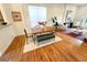 Charming dining area featuring a wooden table, bench seating, and ample natural light at 3426 N Gilpin St, Denver, CO 80205