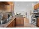 Well-equipped kitchen featuring granite countertops and stainless steel appliances at 3426 N Gilpin St, Denver, CO 80205