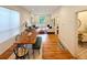 Bright open-concept living area with hardwood floors and stylish furnishings at 3426 N Gilpin St, Denver, CO 80205