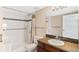 Clean bathroom with tub, shower, and granite vanity at 100 Park W Ave # 1804, Denver, CO 80205