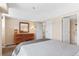 Bright bedroom with ample closet space and ensuite bathroom at 100 Park W Ave # 1804, Denver, CO 80205